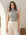 Sleeveless turtleneck top in soft brushed rib fabric with shirttail hem and comfortable stretch