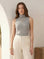 Sleeveless turtleneck top in soft brushed rib fabric with shirttail hem and comfortable stretch
