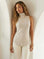 Sleeveless turtleneck top in soft brushed rib fabric with shirttail hem and stretch fit