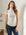 Sleeveless turtleneck top in brushed rib fabric with shirttail hem and comfortable stretch