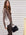 Brown Celine Mixed Media Cardigan with V-neck, tortoiseshell buttons, and striped woven accents